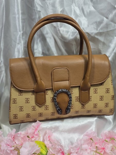 شنطة فخم وأنيقه لون قرميديEE