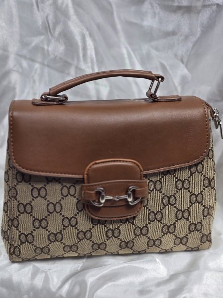 شنط فخمه وأنيقه لون قرميدي OO